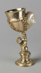Polished Nautilus shell mounted in gilt, wrought, cast and engraved silver